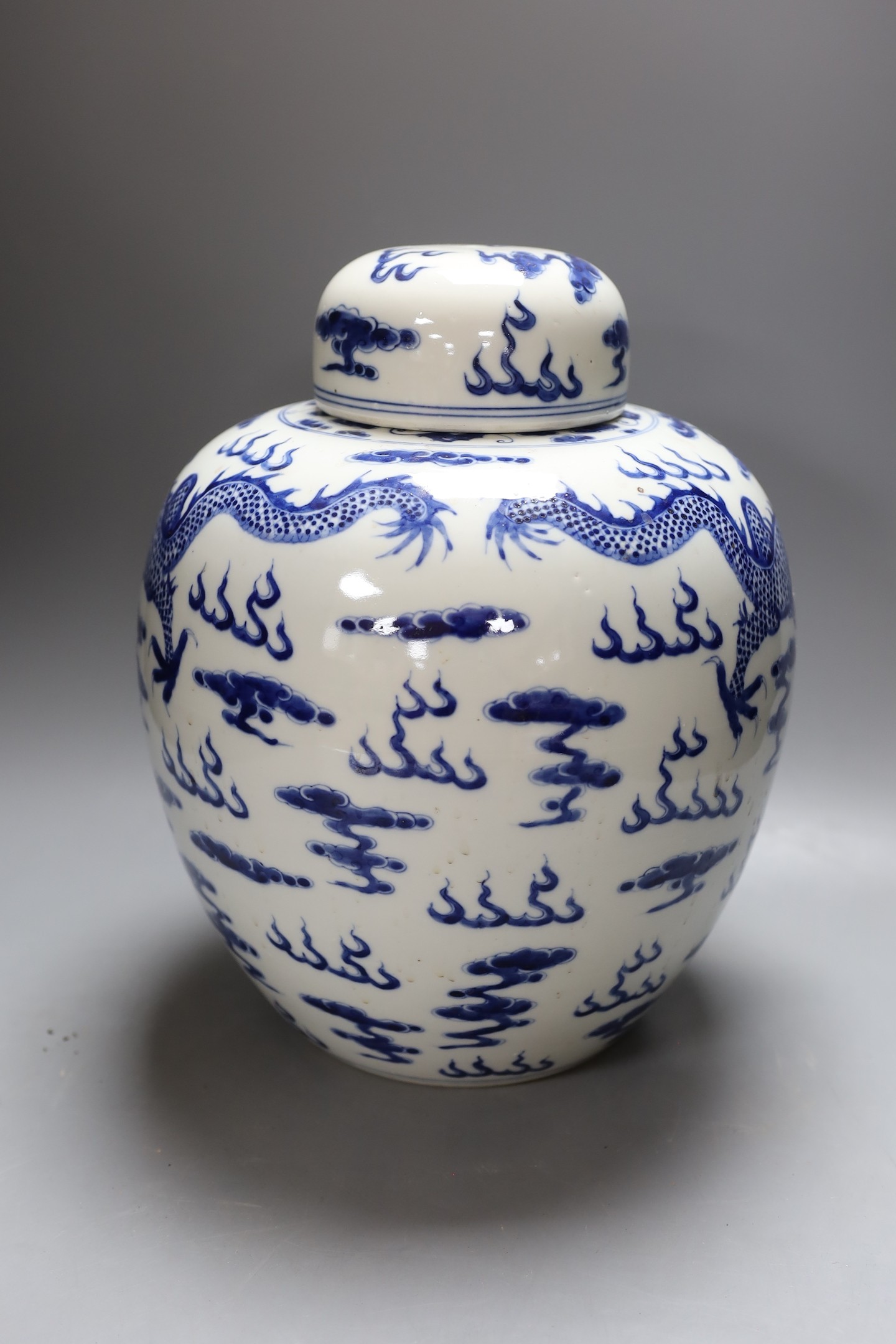 A large Chinese blue and white dragon pattern ginger jar - 34cm tall